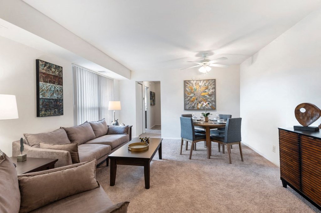 a living room with a couch and a table