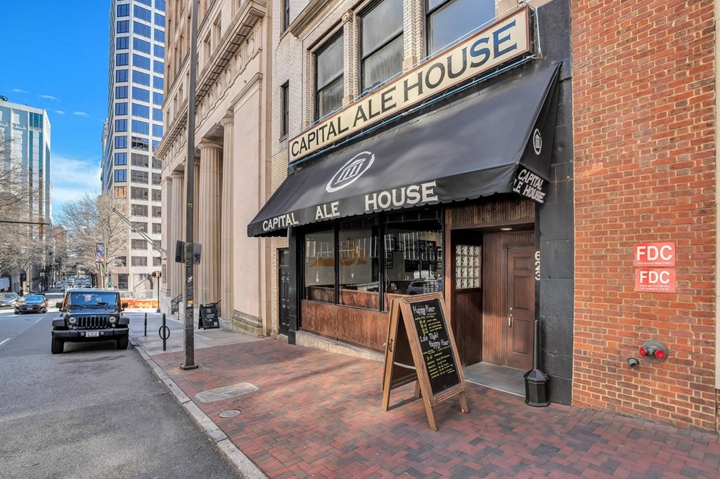 the facade of the central ale house on a city street