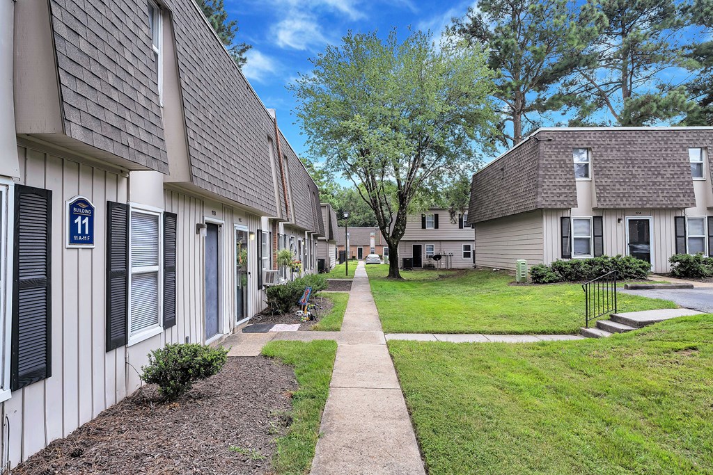 A row of houses with number 11 on the first one.