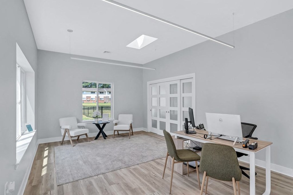 a home office with a desk and a computer