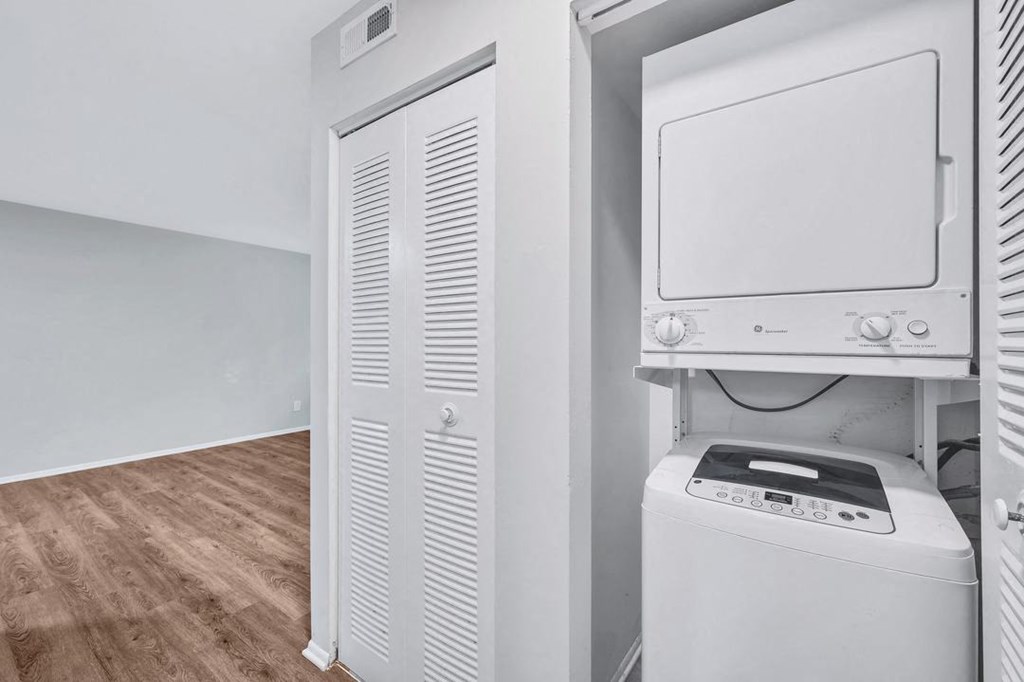 a laundry room with a washer and dryer