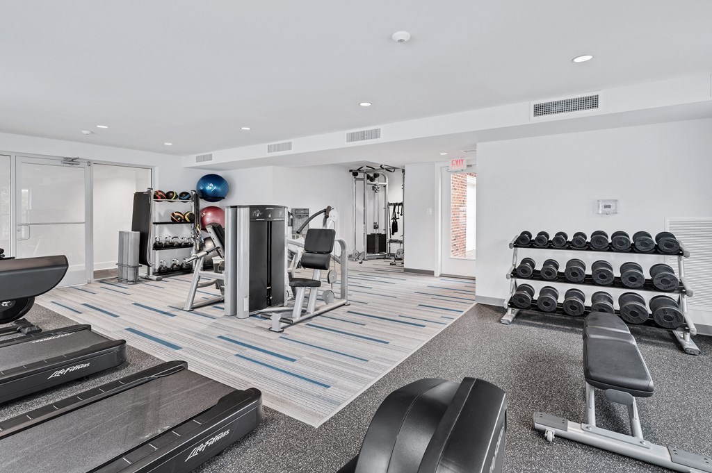 the gym at the enclave at woodbridge apartments in sugar land, tx