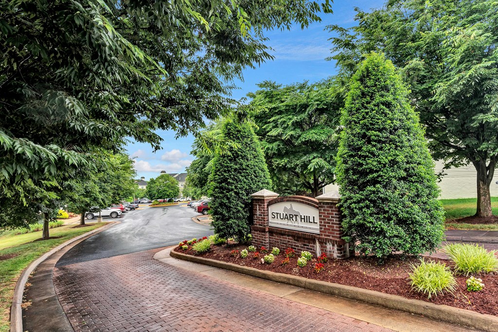 a street with a sign that says sugar hill