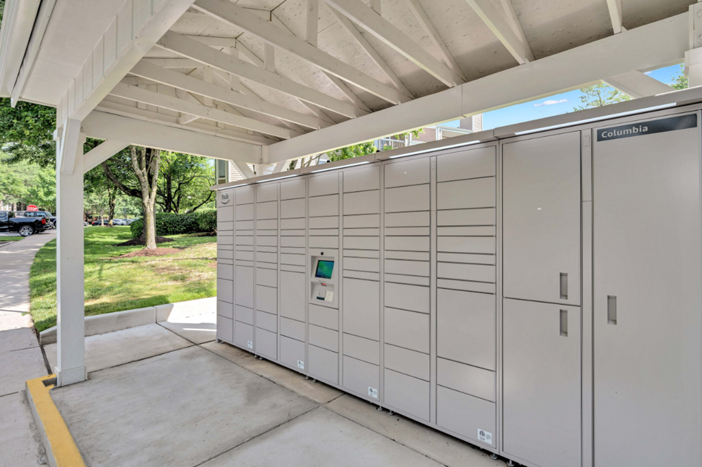 the lockers are tucked under the roof of the garage