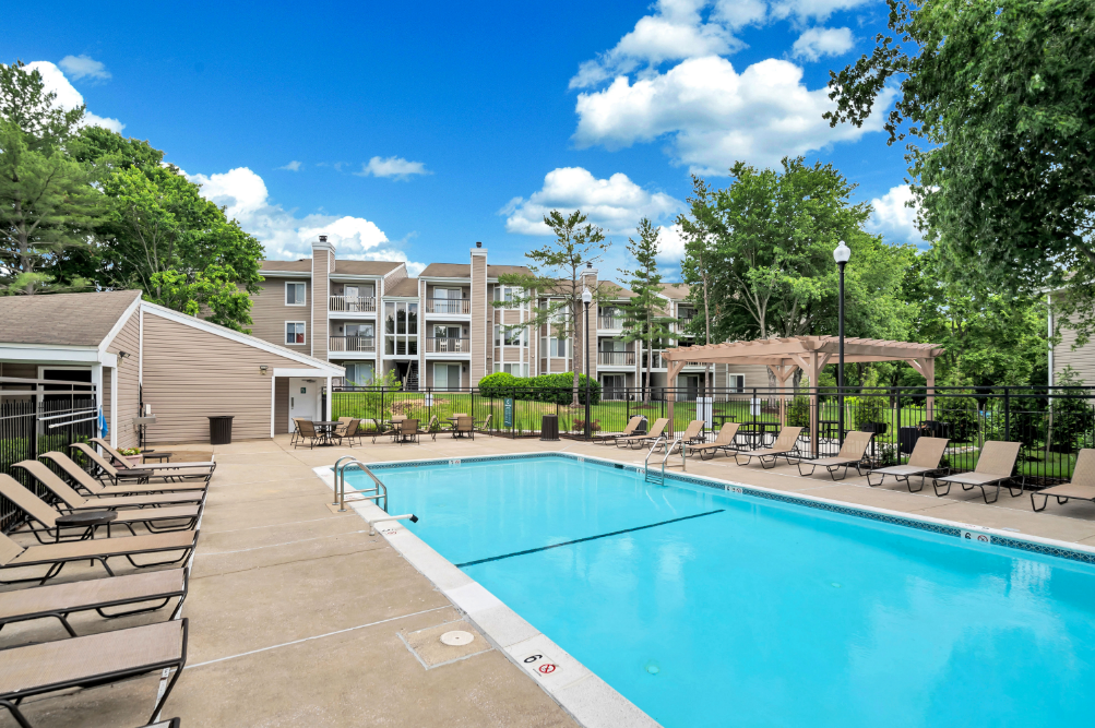our apartments offer a swimming pool with chaise lounge chairs
