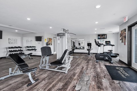 the gym at the flats at big tex apartments