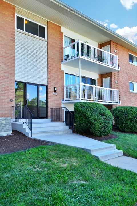 an exterior view of a building with stairs