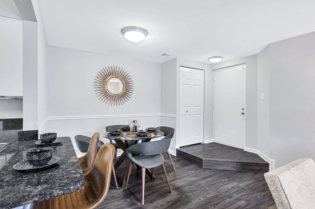 Renovated apartment homes at Waterside at Reston feature separate dining areas as well as bar seating.