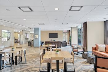 Club Room featuring Kitchen, Wet Bar, Lounge Area and Game Room