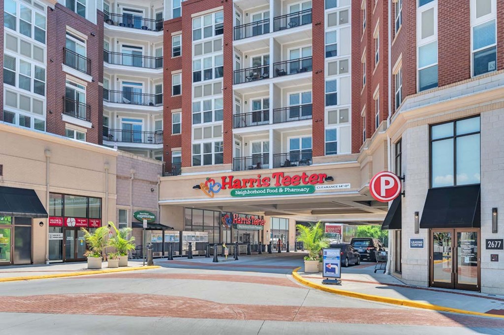 a building with a large sign on the side of a street