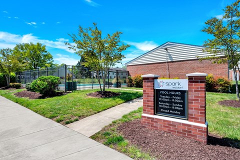 A sign in front of a building that says