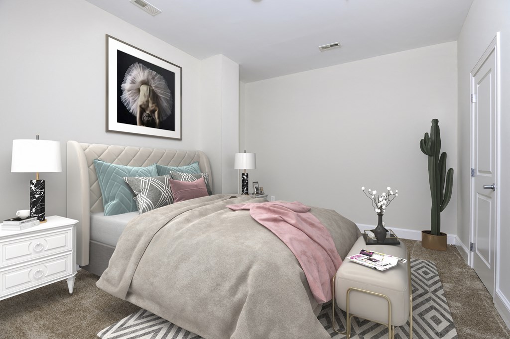 a bedroom with a bed and a cactus