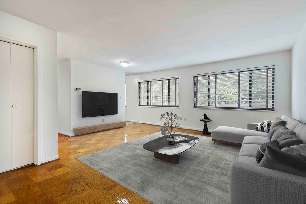 a living room with a couch and a tv