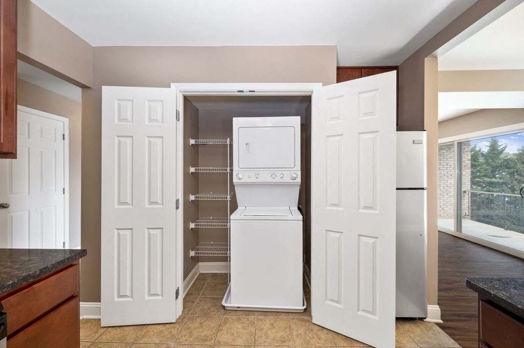 a laundry room with a washer and dryer in it