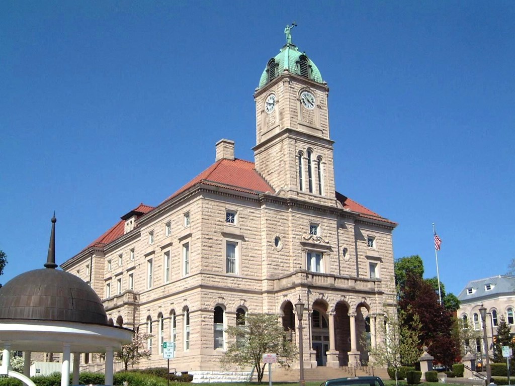 a large stone building with a clock tower