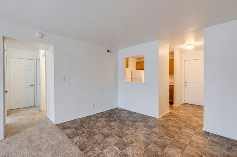 A room with a tiled floor and white walls.