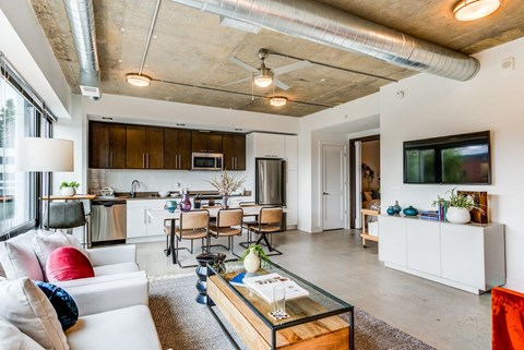 a living room with a couch and a table