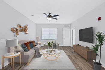 The living room in the Douglas floor plan at Overlook at Riverside. - Photo Gallery 3