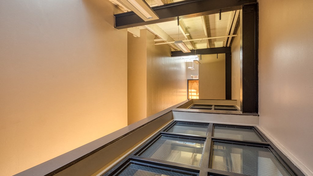 a view of a glass floor in a hallway