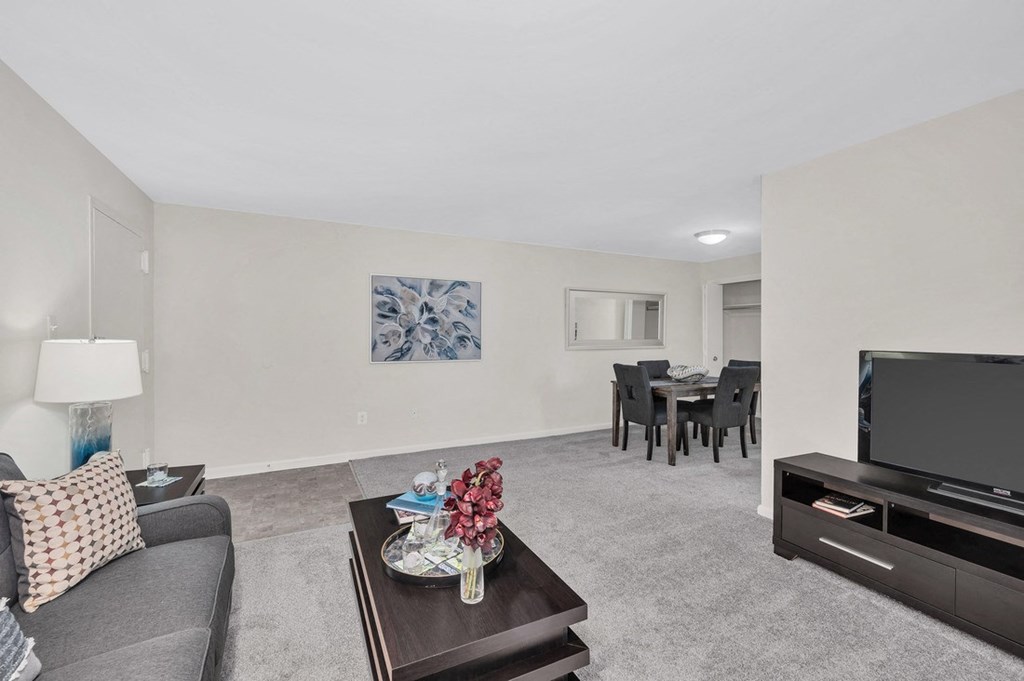 a living room with a couch and a coffee table