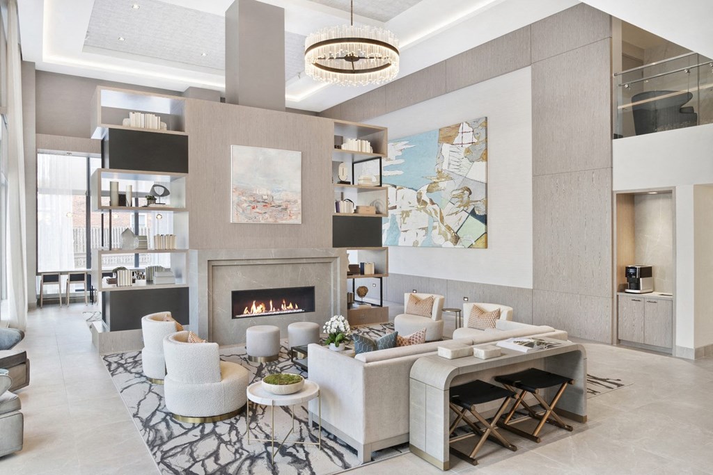 a living room filled with furniture and a fireplace