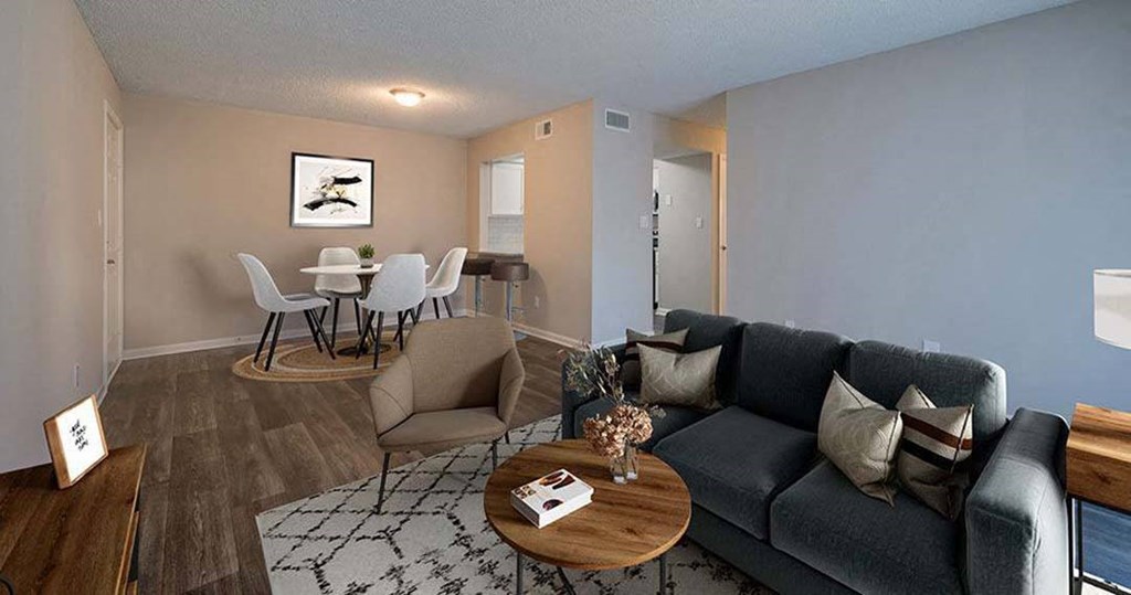 a living room with a couch and a table