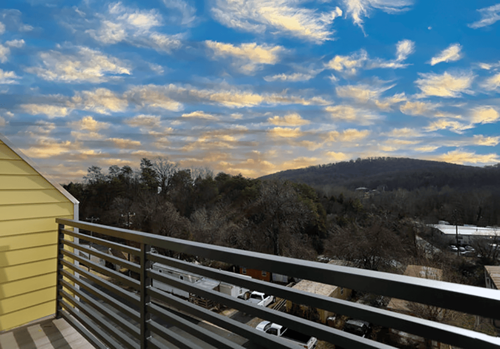 the view of the mountains from the balcony