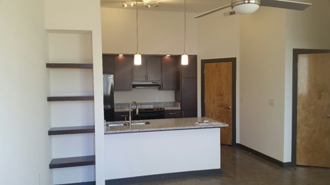 a view of the kitchen from the living room
