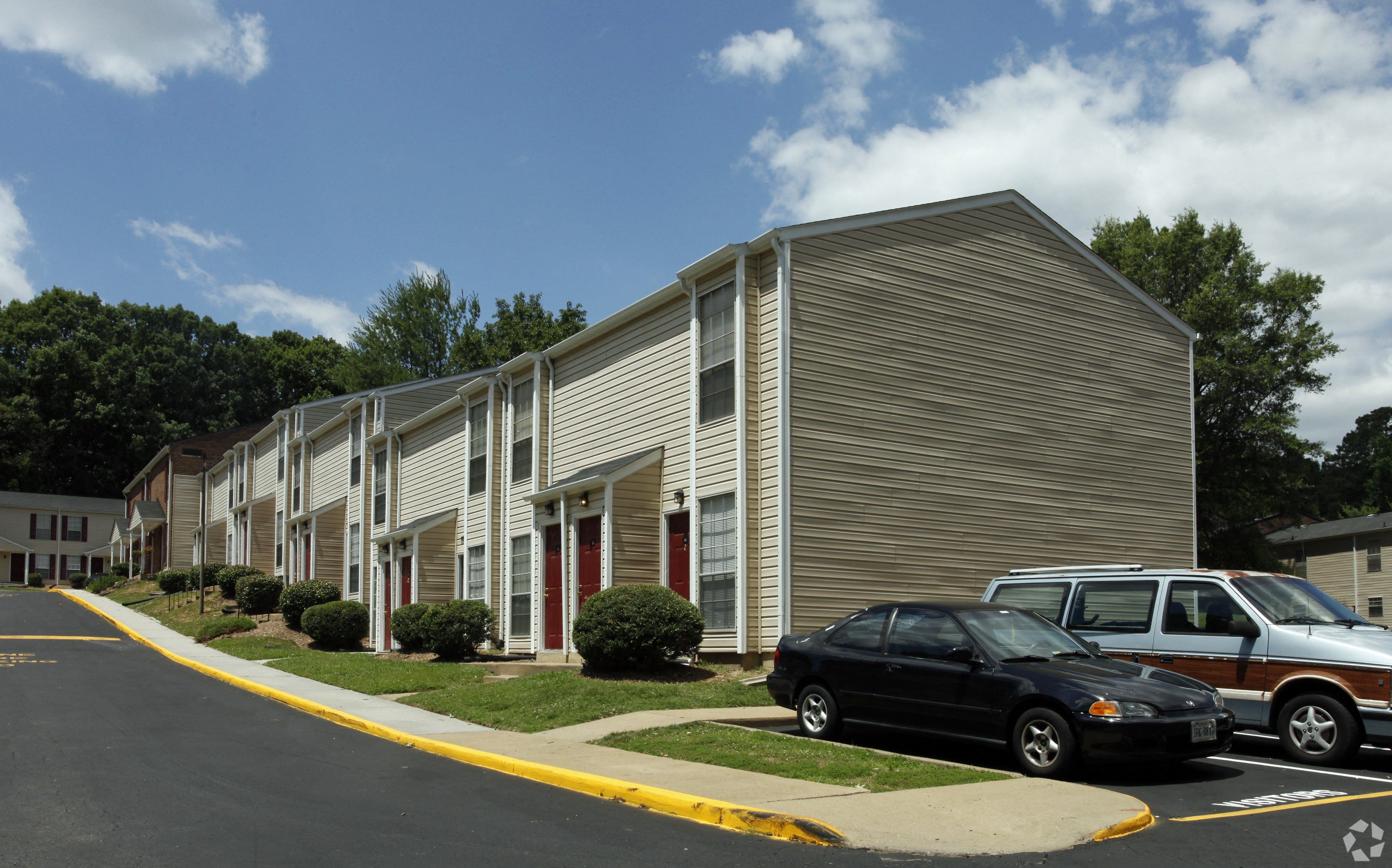 a building with cars parked in front of it