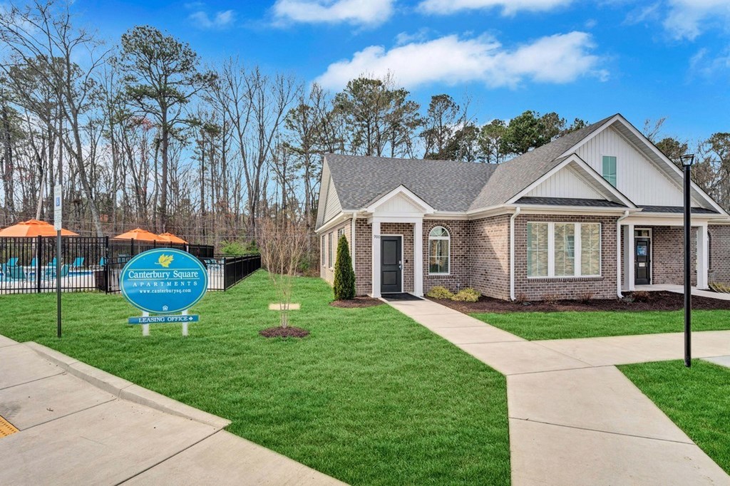 a house with a pool in the background