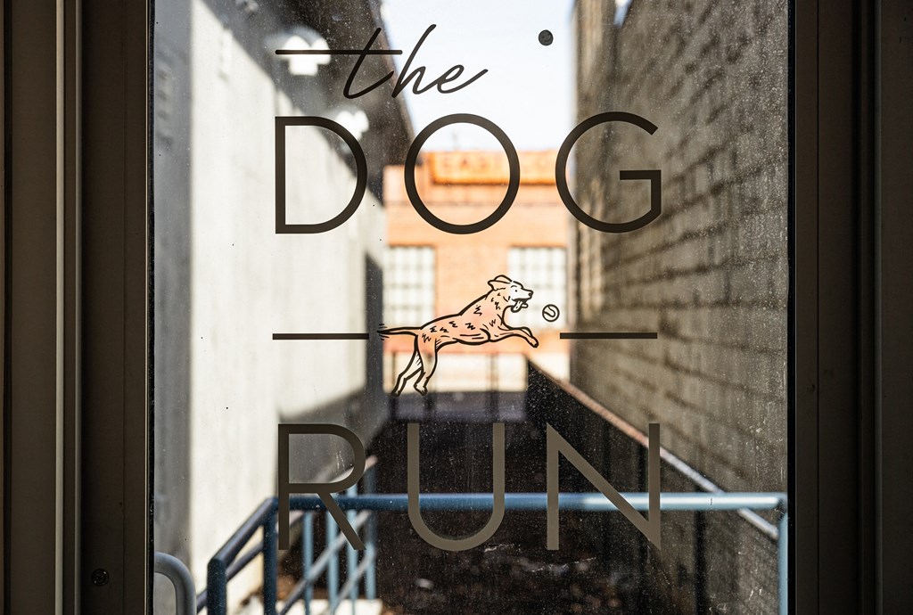 a window with the dog drawn on it