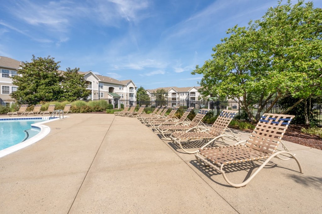 our apartments have a pool and chaise lounge chairs