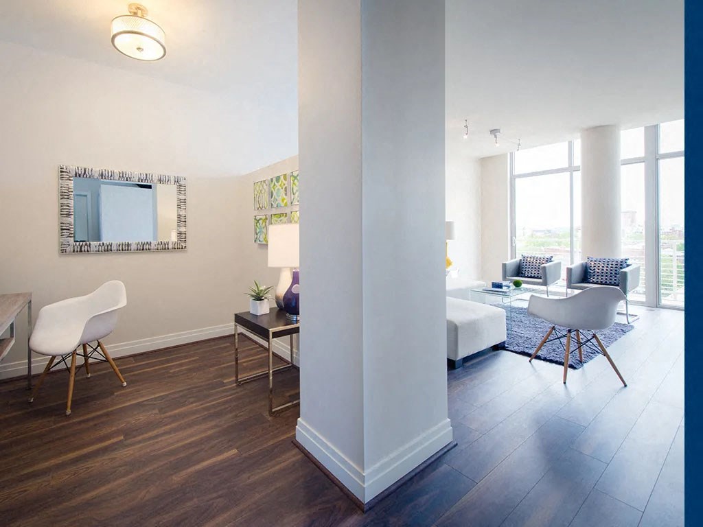 a living room with a couch and a table