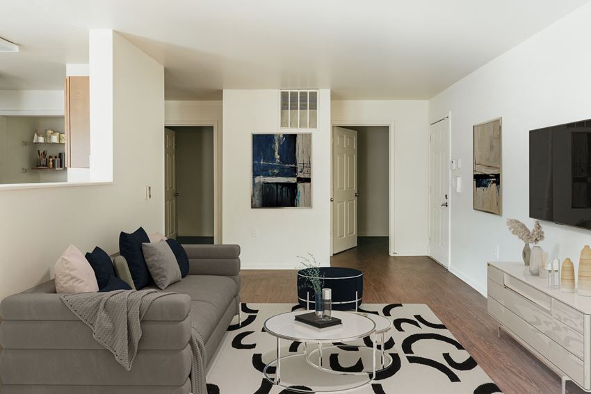 Apartment living room Staged apartment living room-Horace Mann Apartments - Photo Gallery