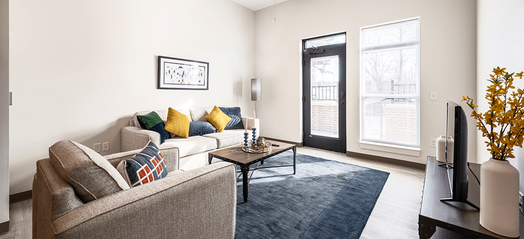 a living room with a couch and a coffee table