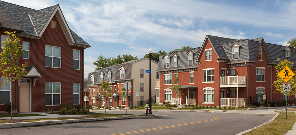 Bedford Hill Apartments brick buildings on the side of a street