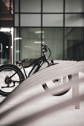 a bike parked on the side of a building