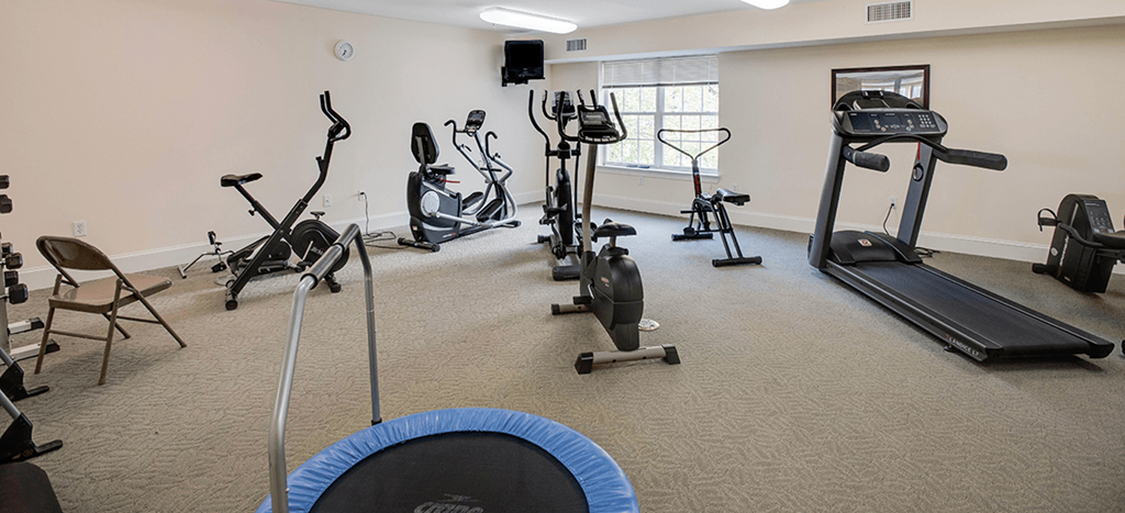 Fitness Center an exercise room with cardio equipment in a resident fitness center