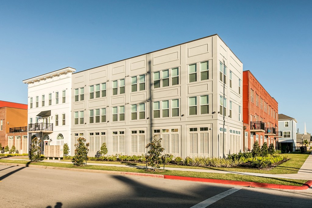 a large building with a street in front of it