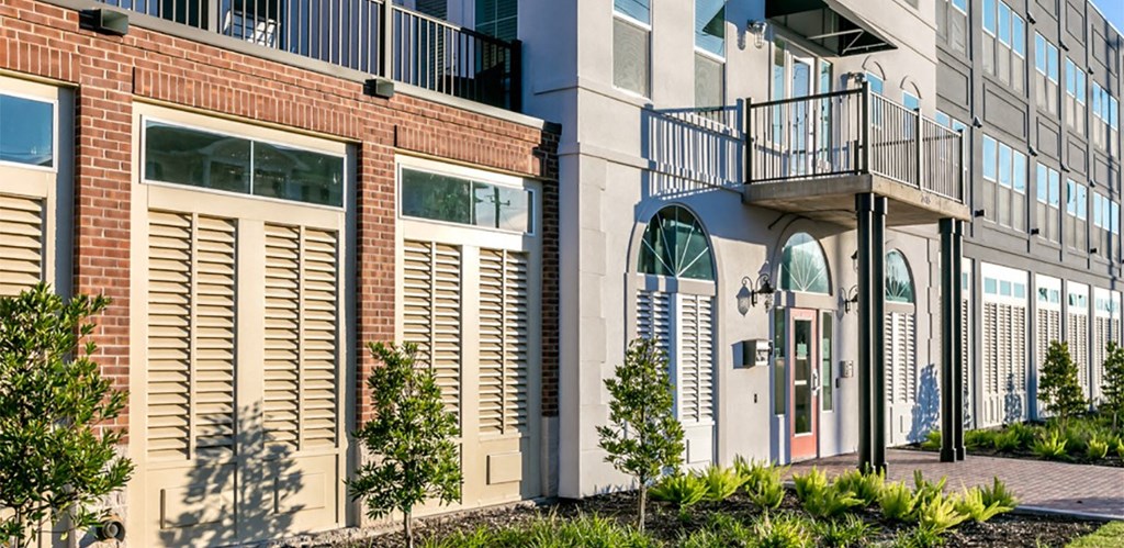 a building with a balcony on the side of it