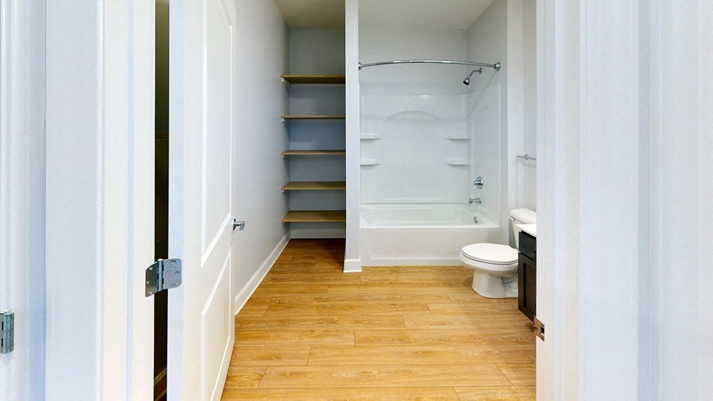 a small bathroom with a toilet and a shower at City Square 162