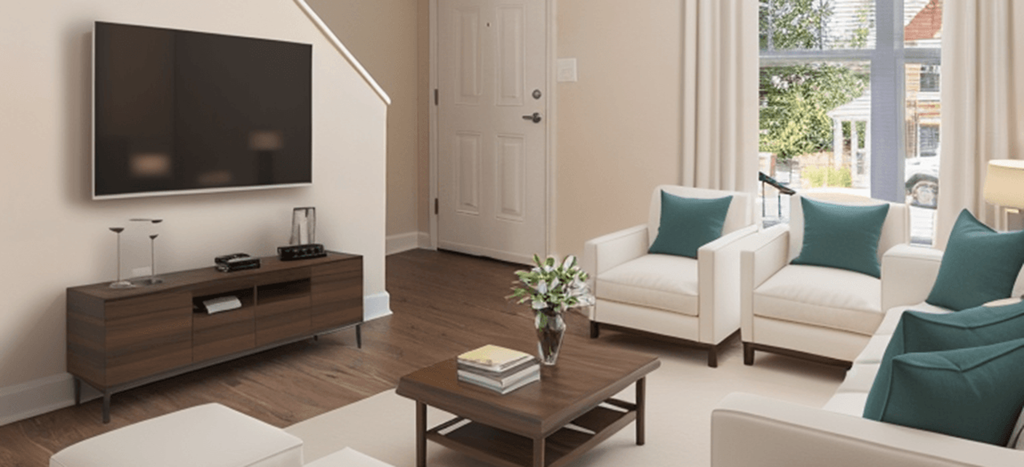a living room with a couch and a television at Crawford Square Apartments