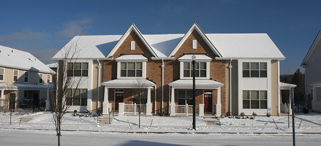 apartments covered in snow in the winter at Fairfield Apartments