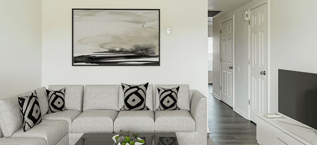 a living room with a couch and a table