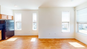 Apartment dining and living room area-Legacy Pointe at Poindexter, Columbus, OH - Photo Gallery 15
