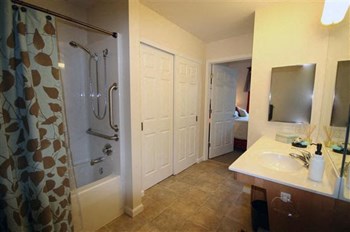 Apartment bathroom-Senior Living at Cambridge Heights Apartments, St. Louis, MO - Photo Gallery 12