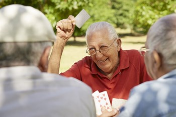 Elderly friends playing cards, Allen Market Lane Apartments St. Louis, MO - Photo Gallery 21