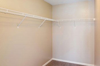 Apartment Bedroom Closet Apartment bedroom closet-Bridgeport Apartments Lincoln, NE - Photo Gallery 4