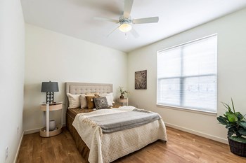 Furnished apartment bedroom-Legacy Pointe at Poindexter Columbus, OH - Photo Gallery 30