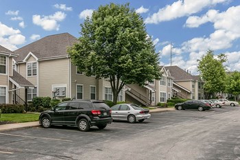 Apartment Building Exterior Apartment building exterior and parking lot-Longfellow Heights Apartments, Kansas City, MO - Photo Gallery 2